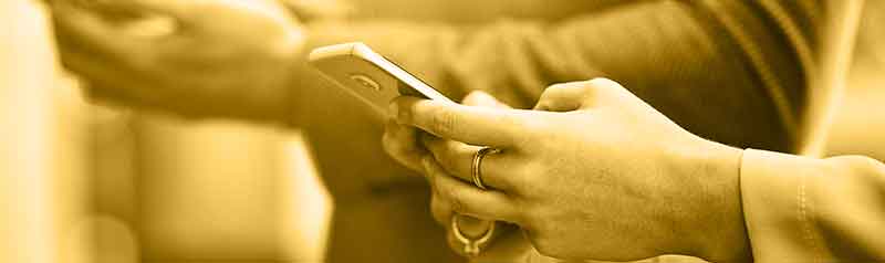 Hand holding cell phone